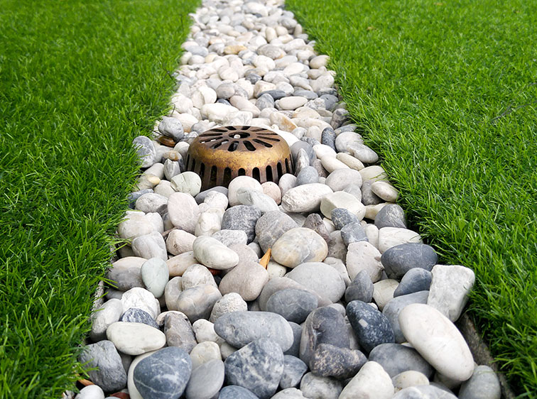 How Does Water Drainage Work With Synthetic Turf in Texas Yards